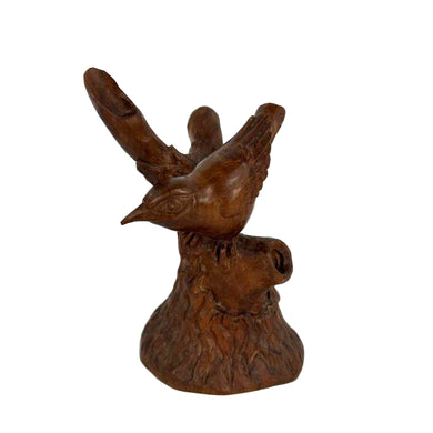 Carved Wooden Bird on Branch